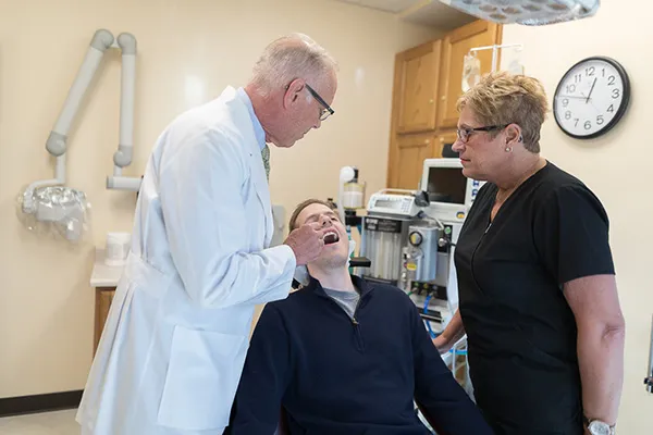 Dr. Fraser with patient